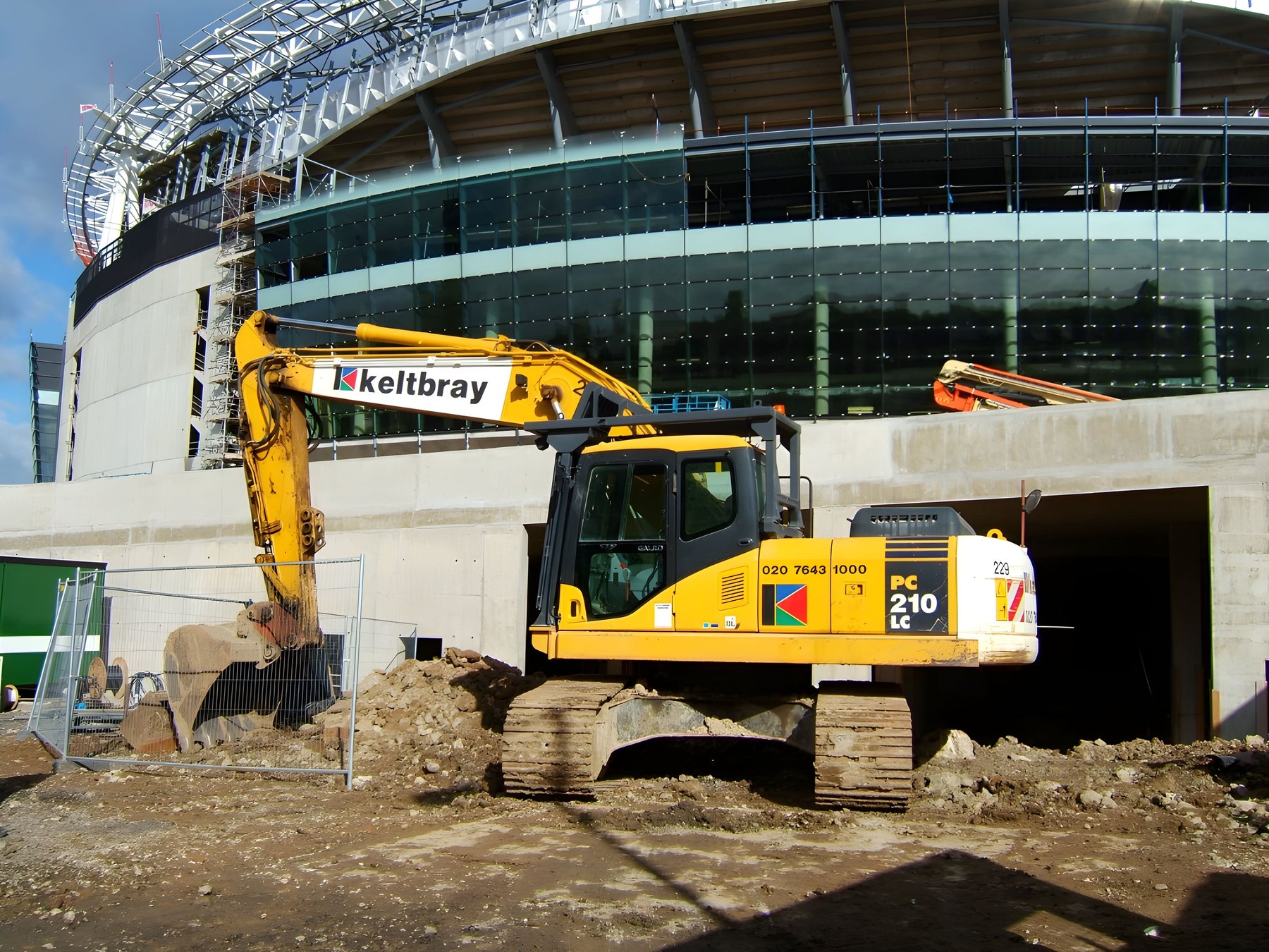 Excavator working outside a London stadium